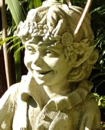 pip laughing fairy stone statue garden ornament-face detail